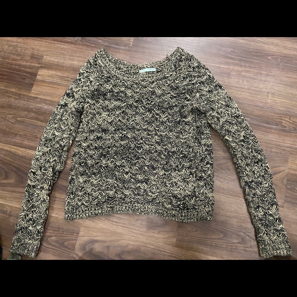 Maurice’s knit sweater with open back. Size medium.